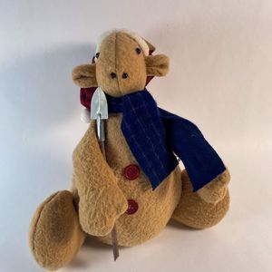 Plush Snow Shovelling Reindeer with scarf and hat.